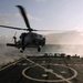 SH-60B Seahawk lands on flight deck of guided-missile destroyer USS Arleigh