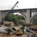 Lifting concrete from I-35 collapse