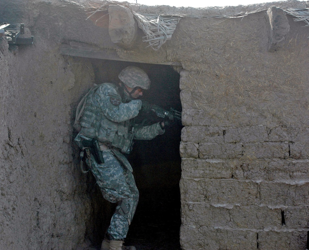 Coalition Forces Search for Weapon Caches in Iraq