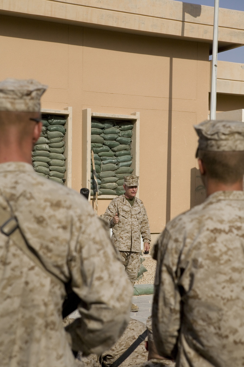 Assistant Commandant of the U.S. Marine Corps speaks to Marines