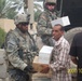 Coalition Forces give humanitarian aid to village