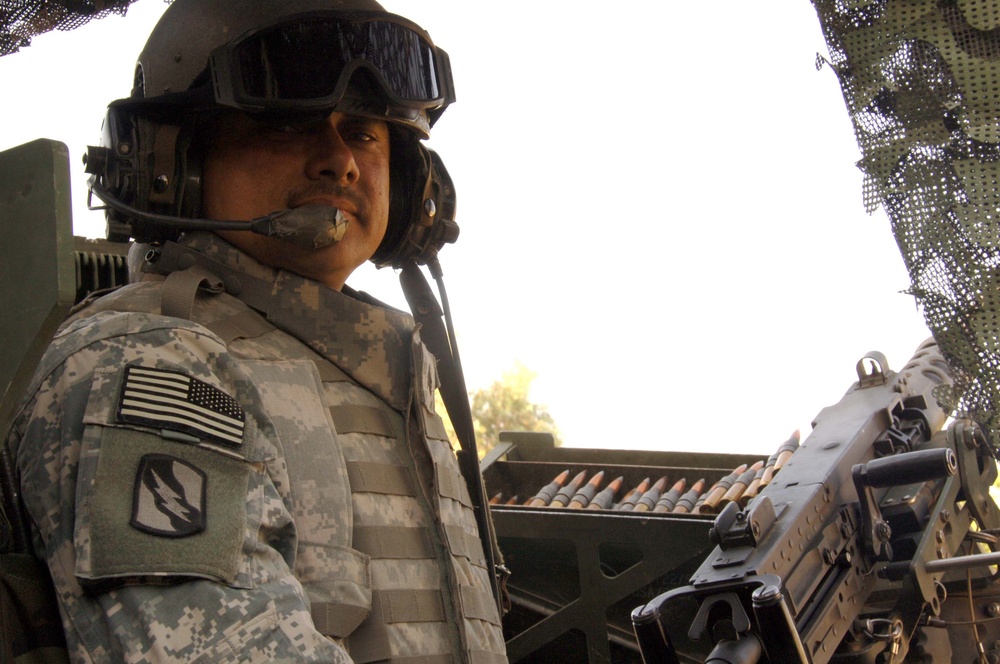 Soldiers Patrol throught the streets of Baghdad