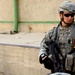 Soldiers Patrol throught the streets of Baghdad