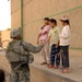 Soldiers Patrol throught the streets of Baghdad