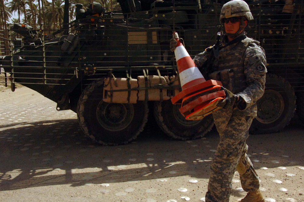 Soldiers Patrol throught the streets of Baghdad