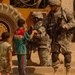 Soldiers Patrol throught the streets of Baghdad