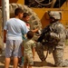Soldiers Patrol throught the streets of Baghdad
