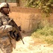Soldiers Patrol throught the streets of Baghdad
