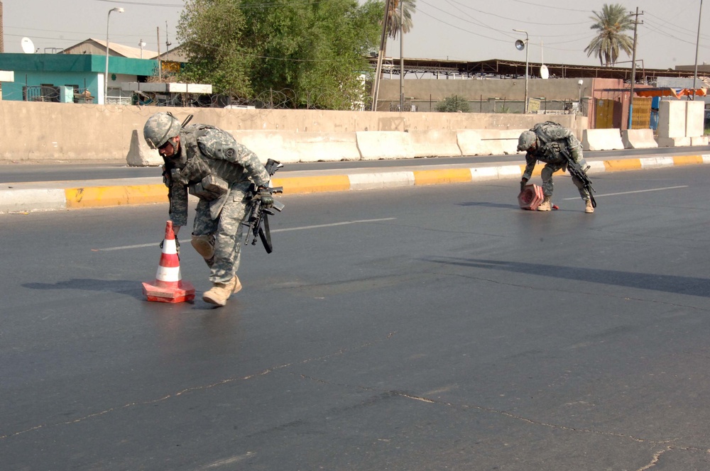 Soldiers Patrol throught the streets of Baghdad