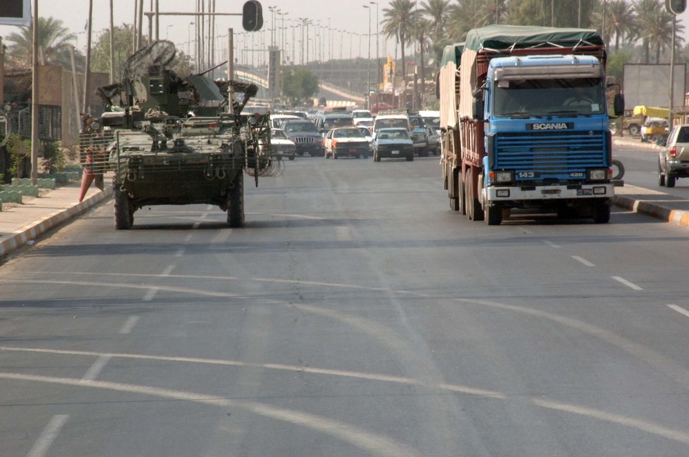 Soldiers Patrol throught the streets of Baghdad