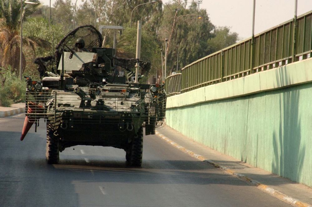 Soldiers Patrol throught the streets of Baghdad