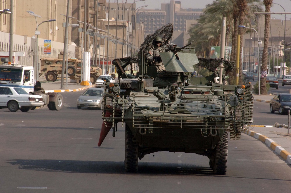 Soldiers Patrol throught the streets of Baghdad