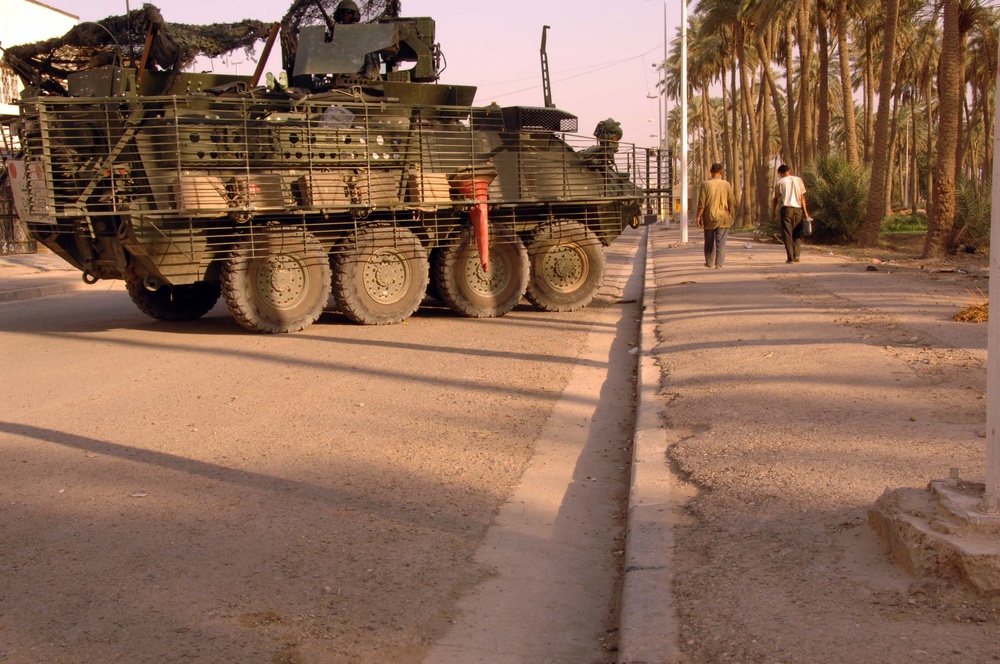 Soldiers Patrol throught the streets of Baghdad