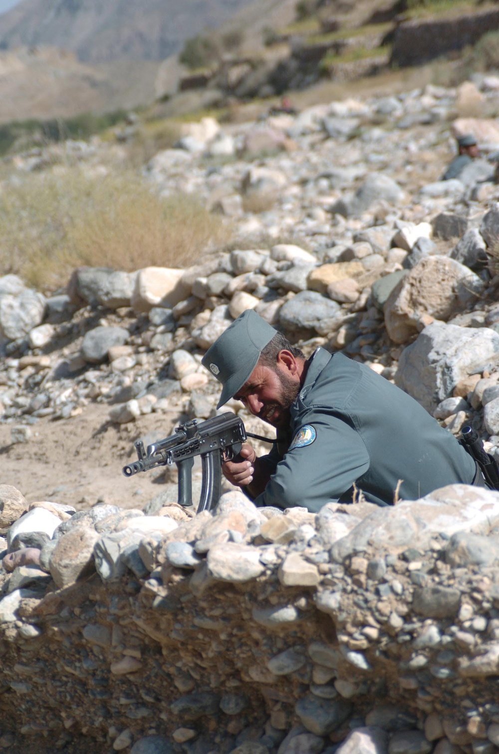 ANP, Coalition forces team up to destroy cache near desolate village, foste