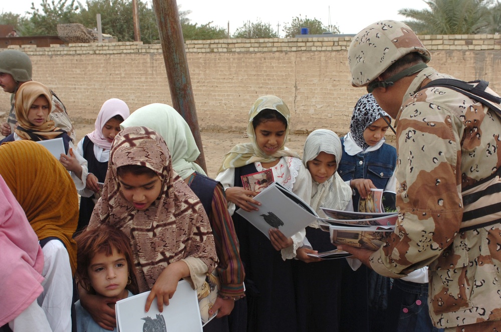 Iraqi army 'Junior Hero' visits school children in Jerf Al-Mi