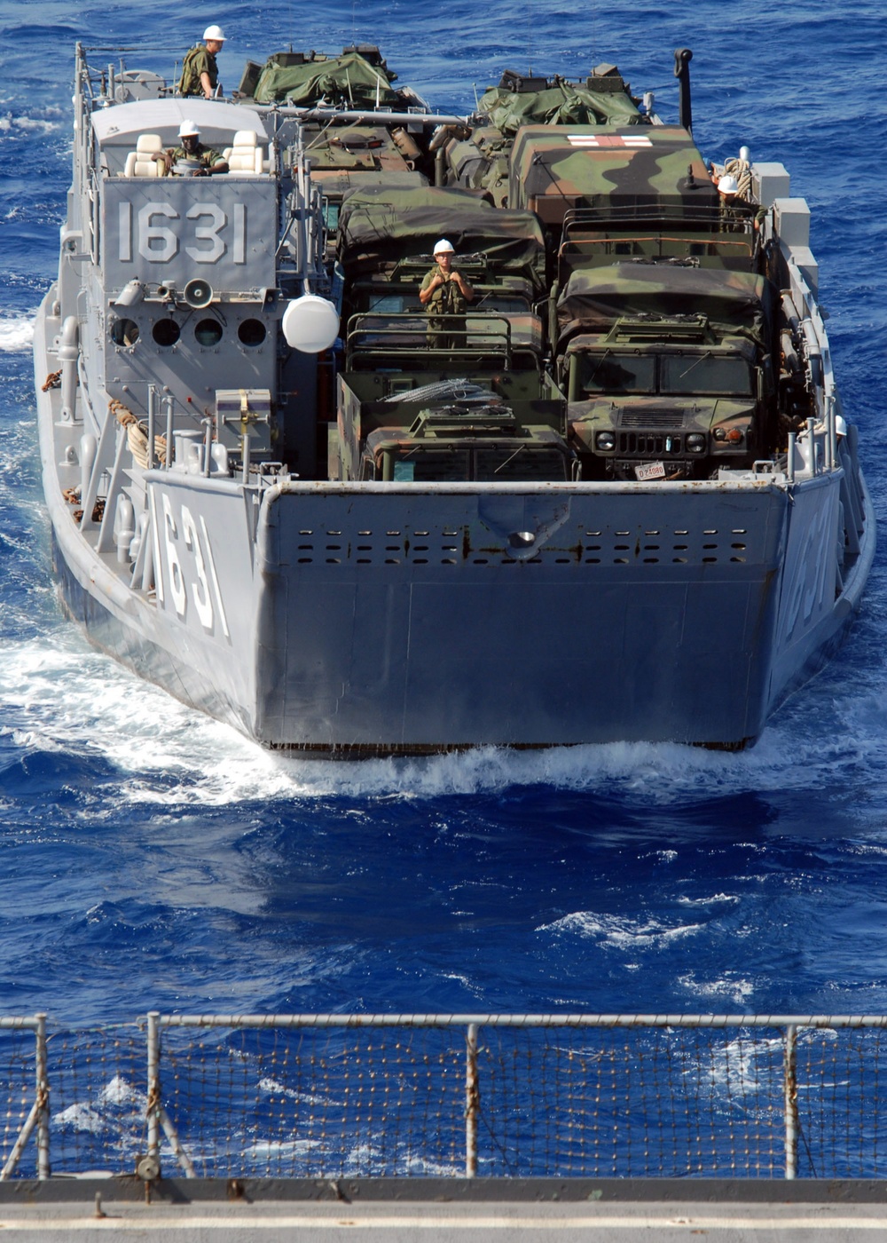 Landing Craft docks at USS Tortuga