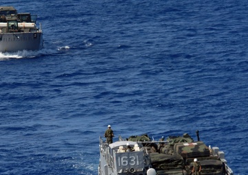 Landing Craft docks at USS Tortuga