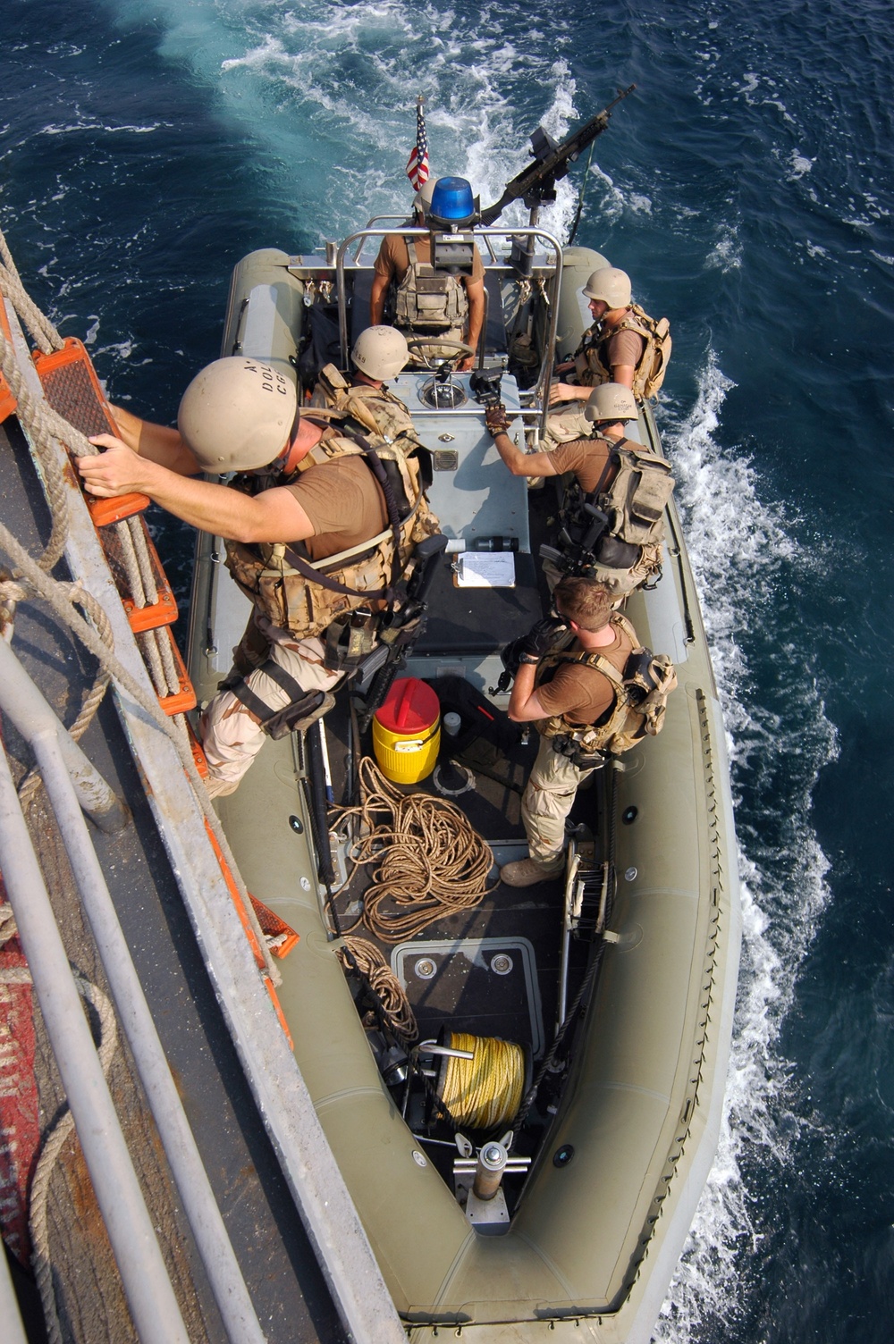 Sailors prepare to conduct boarding operations