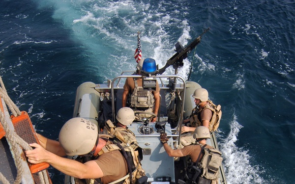 Sailors prepare to conduct boarding operations