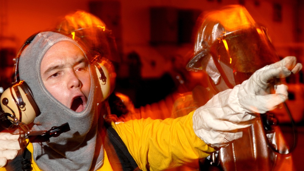 Team in Action During Simulated Aircraft Fire