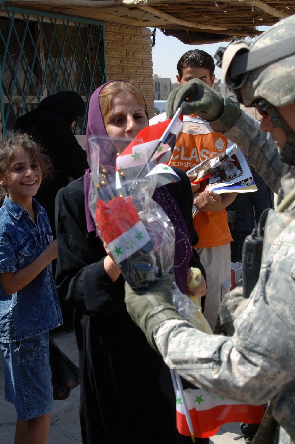 Soldiers at a small mall in Saha, Baghdad