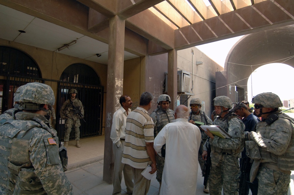 Soldiers at a small mall in Saha, Baghdad