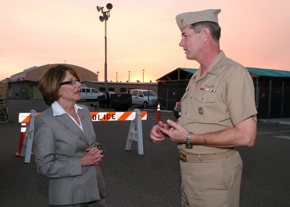 Congresswoman and Admiral Tour Shelter for Military Familes