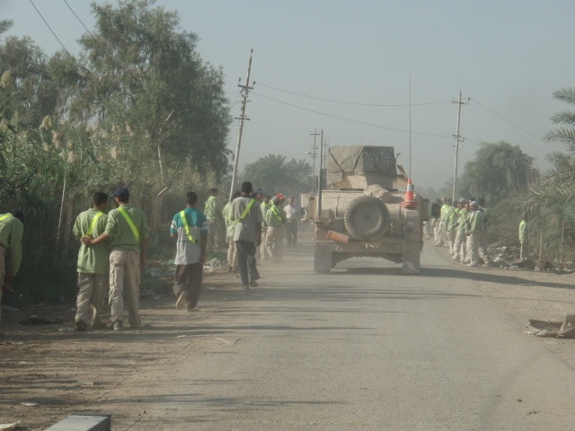 Concerned Local Citizens patrol with Soldiers, NP in Al Ja'ara