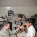 1-8 Cavalry Soldiers help provide medical aid