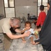 1-8 Cavalry Soldiers help provide medical aid