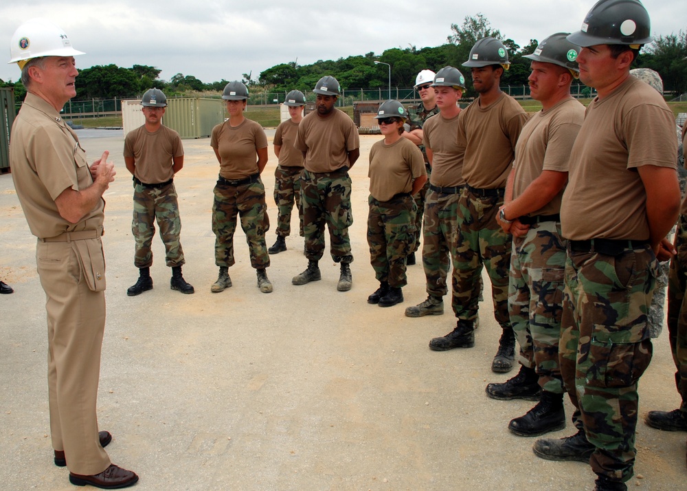 Rear Adm. Jamie Kelly visits with Seabees