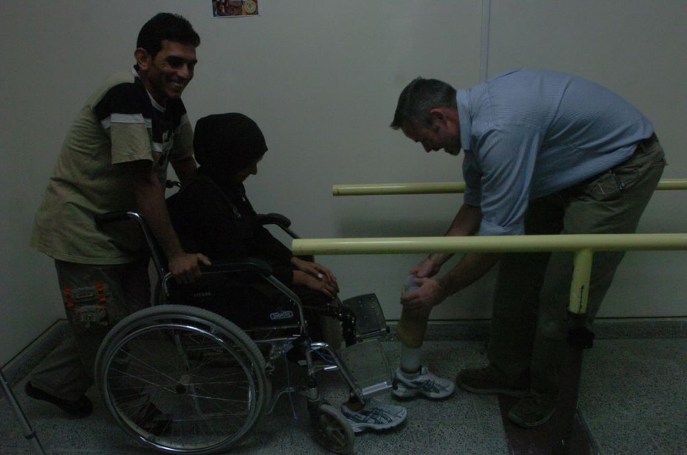 Young Iraqi woman gets a chance to walk again