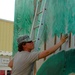 215th BSB soldier mixes paint with selfless service