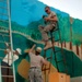 215th BSB soldier mixes paint with selfless service
