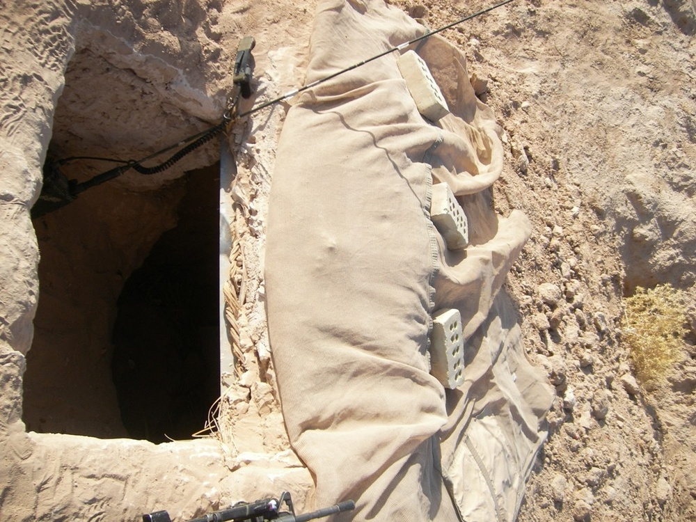 Coalition forces find terrorist detention facility, large weapons cache