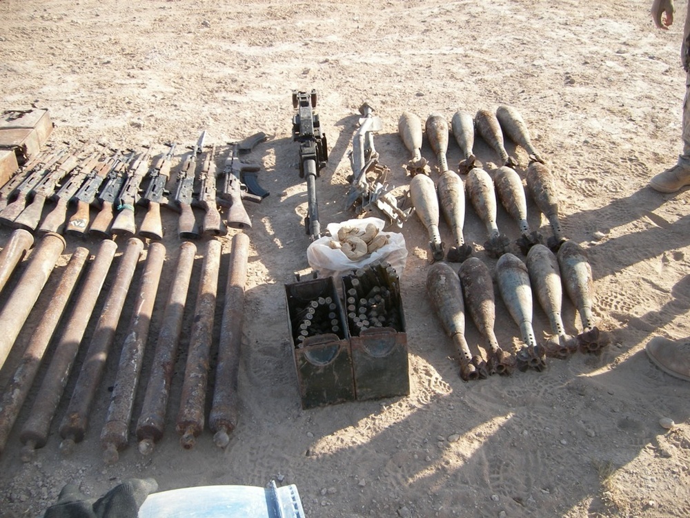 Coalition forces find terrorist detention facility, large weapons cache
