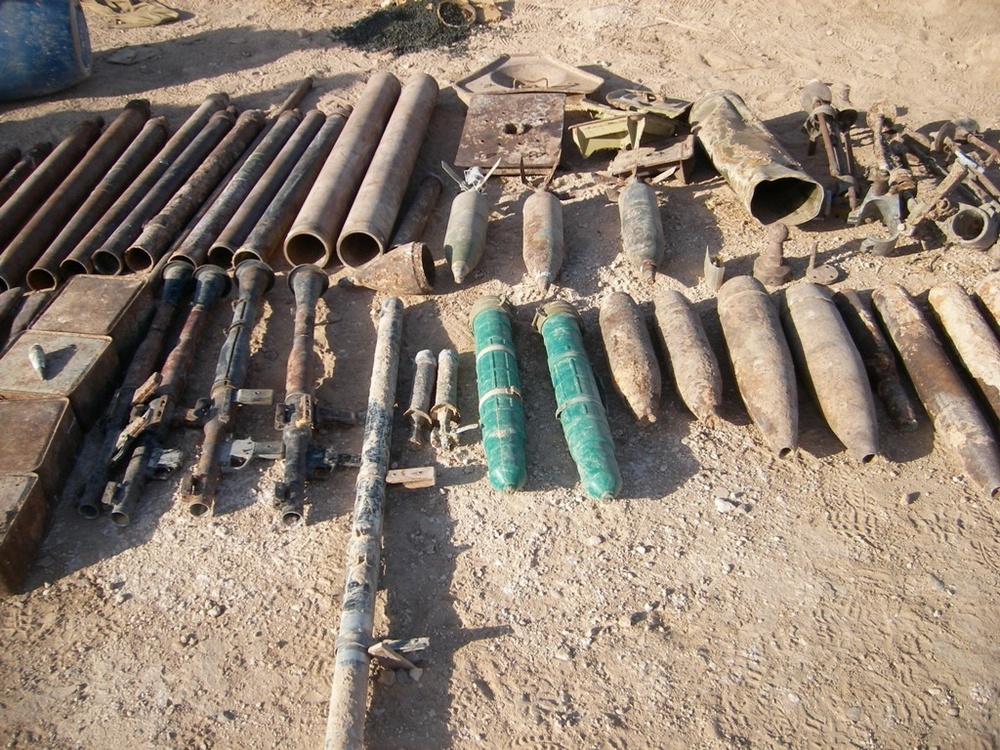 Coalition forces find terrorist detention facility, large weapons cache