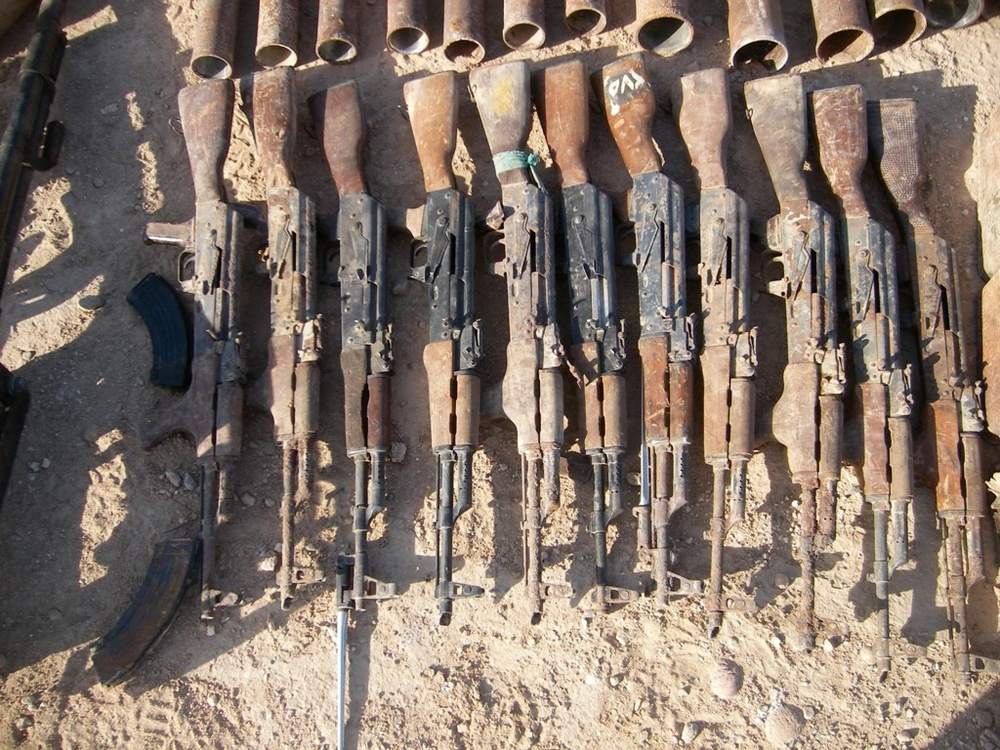 Coalition forces find terrorist detention facility, large weapons cache