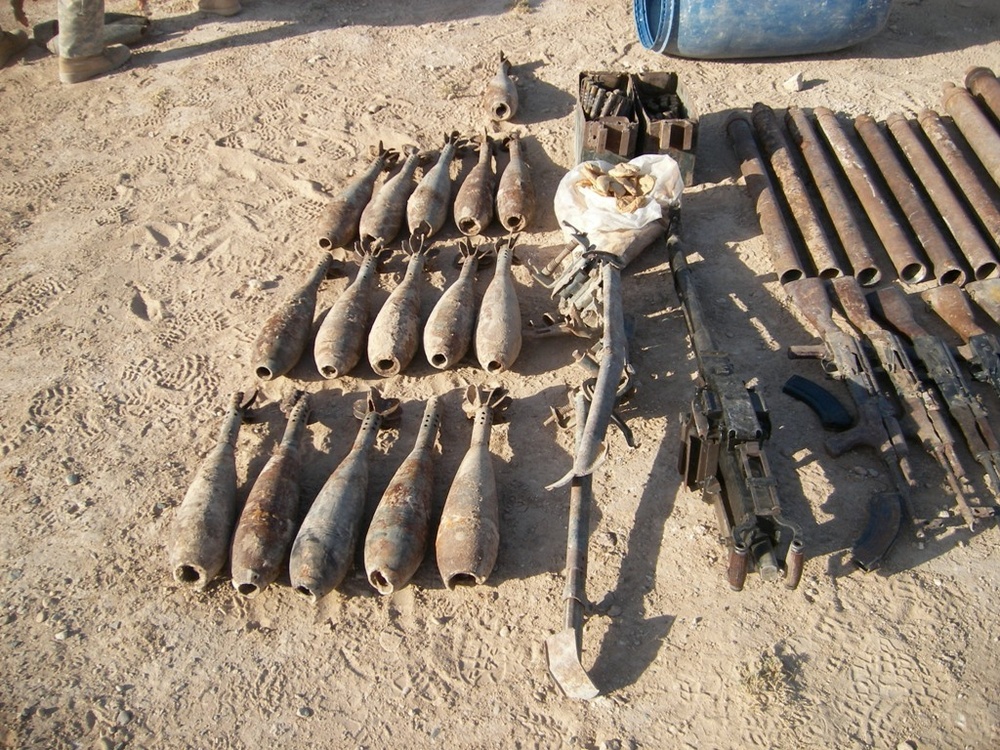 Coalition forces find terrorist detention facility, large weapons cache