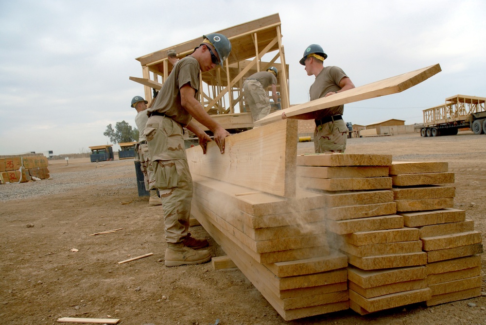 Seamen loads wood supplies