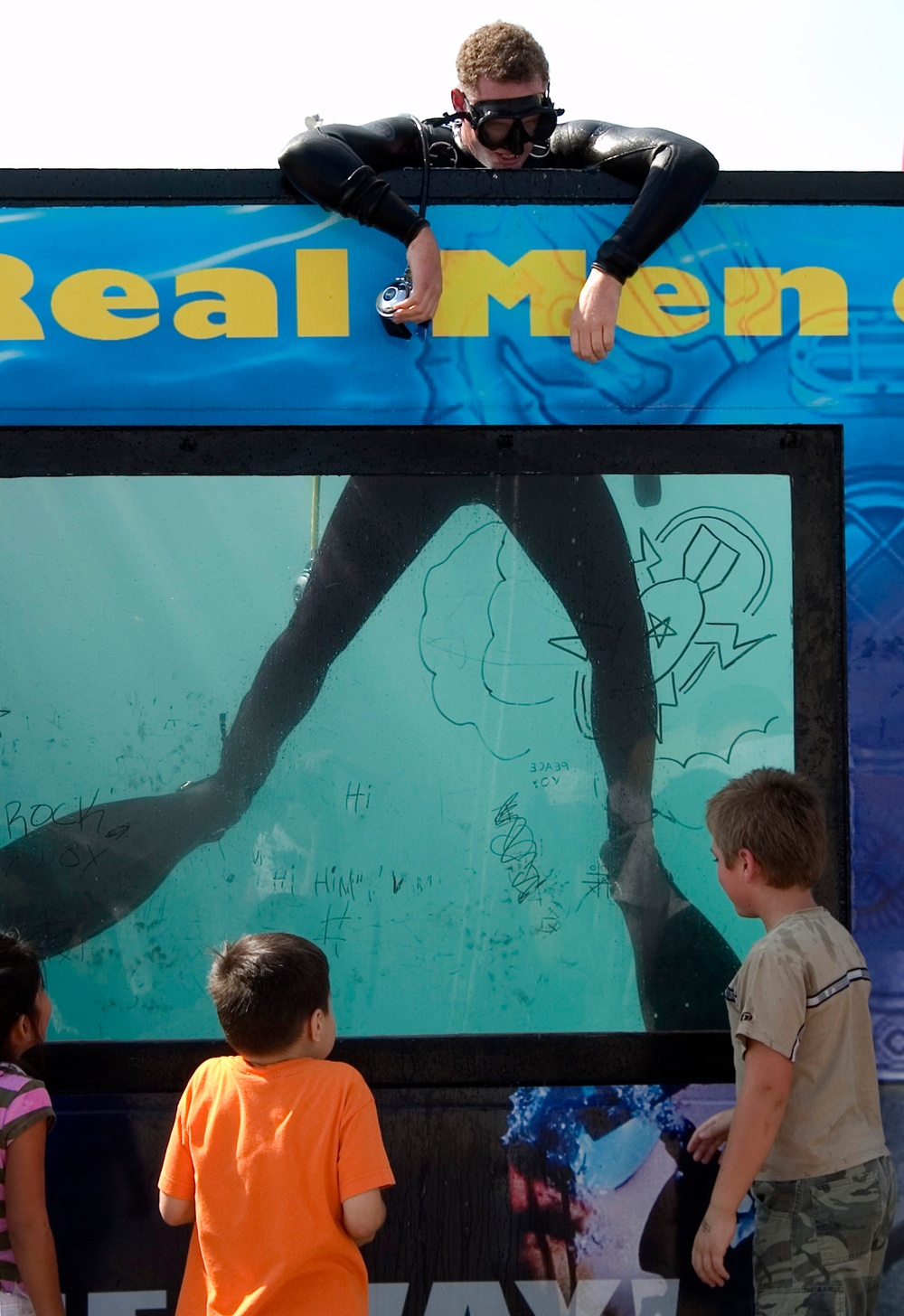 Kids play games with Navy Divers