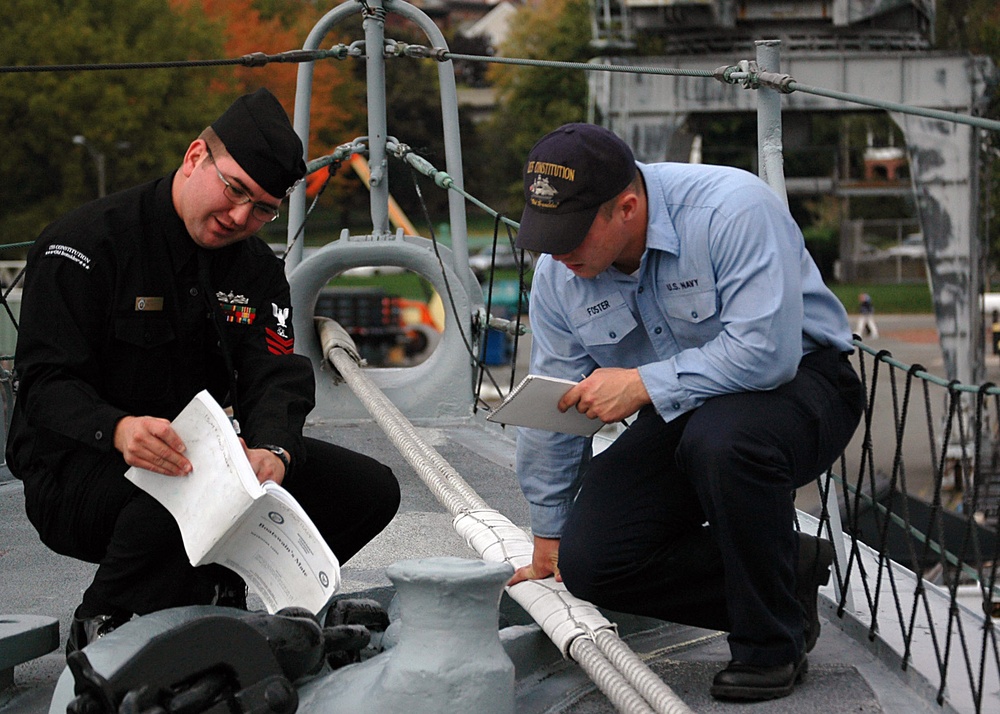 Sailors review boatswain's mate training material