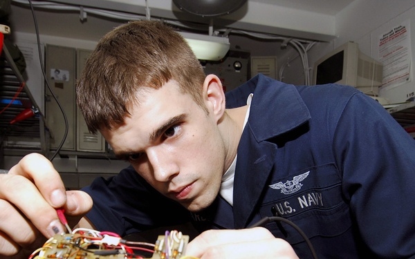 Airman troubleshoots AIC-14