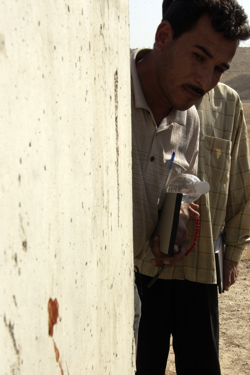 Iraqi Army gets CSI training during mock crime scene exercise