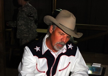 Singing Cowboy entertains Soldiers