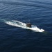 USS Miami submarine surfaces for exercise