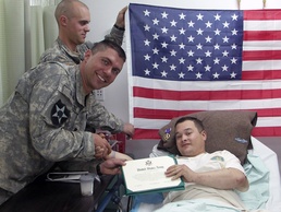 Soldier re-enlists hours after IED injury