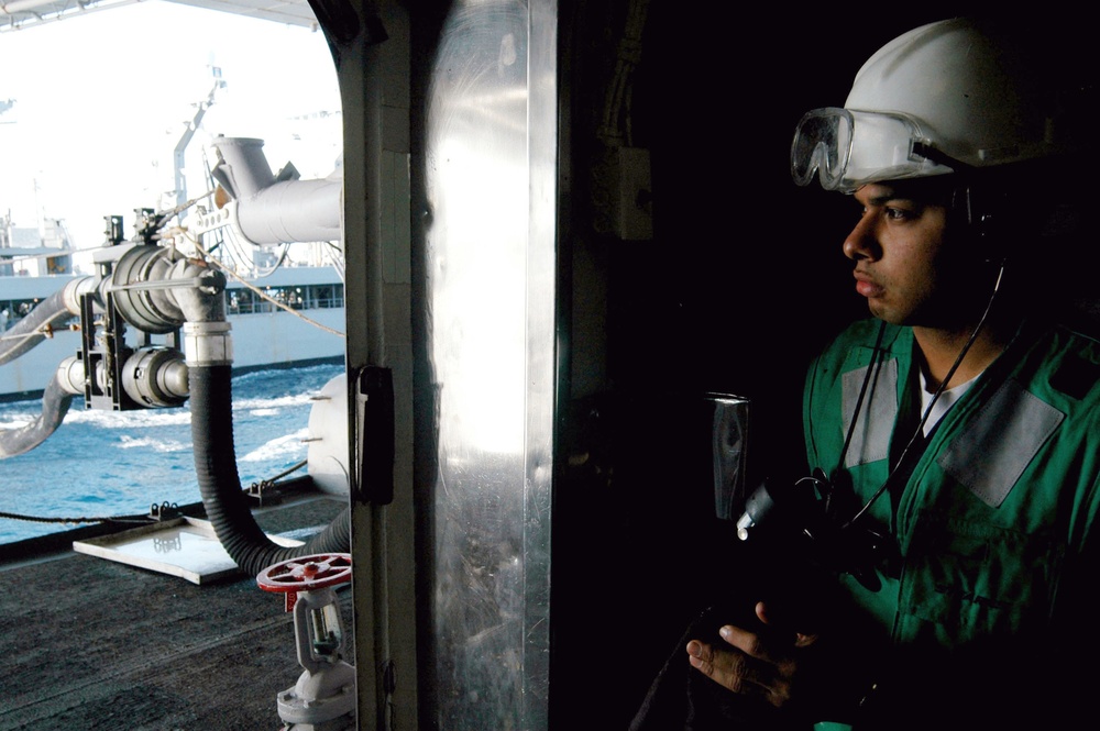 replenishment oiler USNS Pecos refuels USS Kitty Hawk
