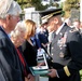 During a ceremony, Nov. 11, at the Hemet, Calif., Veteran's Memorial, Brig. Gen. Ricky Rife, right, director of program analysis and evaluation, office of the Deputy Chief of Staff, presents the Distinguished Service Cross to Phoebe, second from left, and