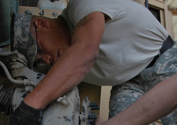 'Like a Pit Crew,' Mechanics Keep Batteries Firing